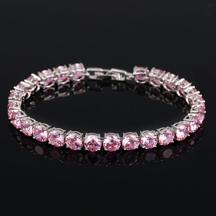 Women's shimmering crystal heart tennis bracelet, ideal for adding sparkle to any outfit.