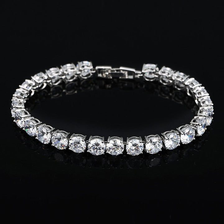 Elegant women's silver-tone crystal heart tennis bracelet, a captivating piece of jewelry.