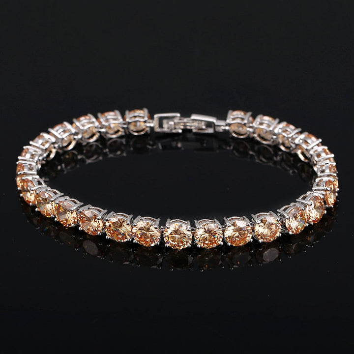 Adjustable women's tennis bracelet featuring numerous sparkling crystal hearts, gift for her.