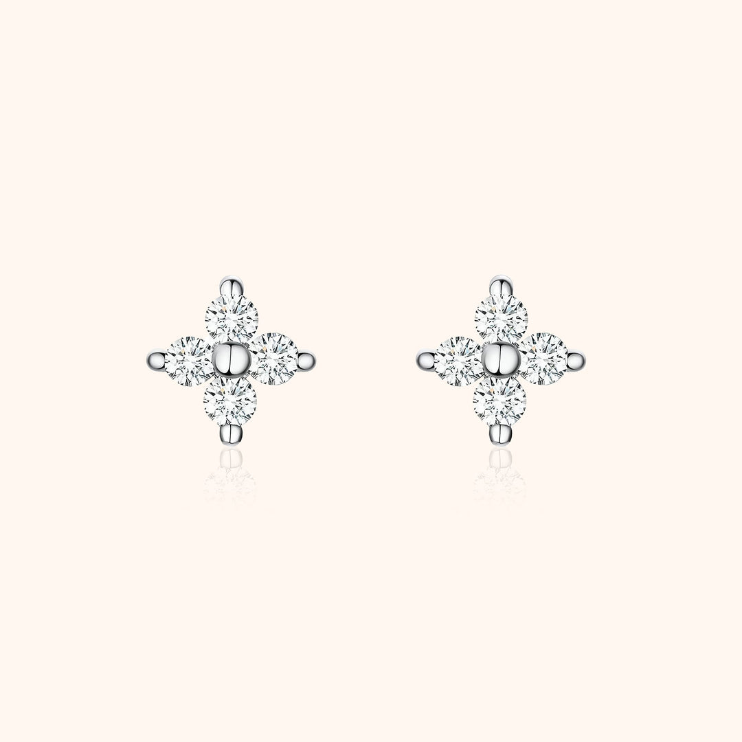 Sparkling women's flower zirconia stud earrings. Delicate sterling silver jewelry, perfect for elegant everyday wear.