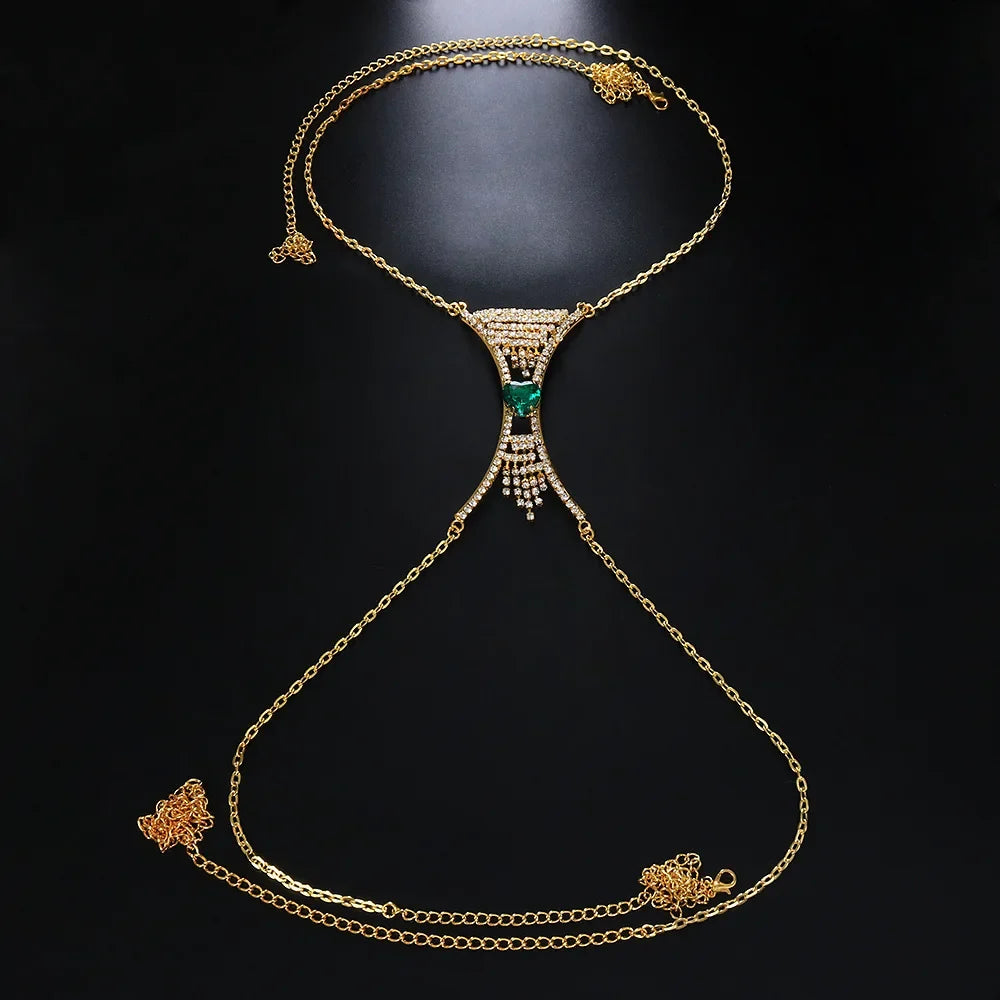 Close-up of a women's heart crystal body chain, sparkling rhinestones highlight chest and waist.