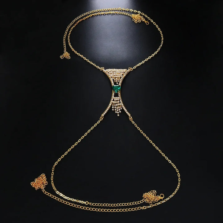 Close-up of a women's heart crystal body chain, sparkling rhinestones highlight chest and waist.