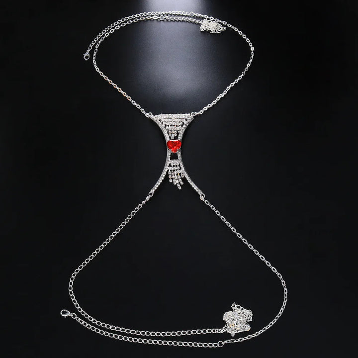 Dazzling heart crystal body chain, women's gold tone rhinestone chest jewelry, statement accessory.