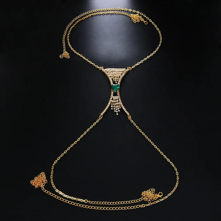 Statement women's body chain featuring intricate heart crystal design, glamorous rhinestone jewelry.
