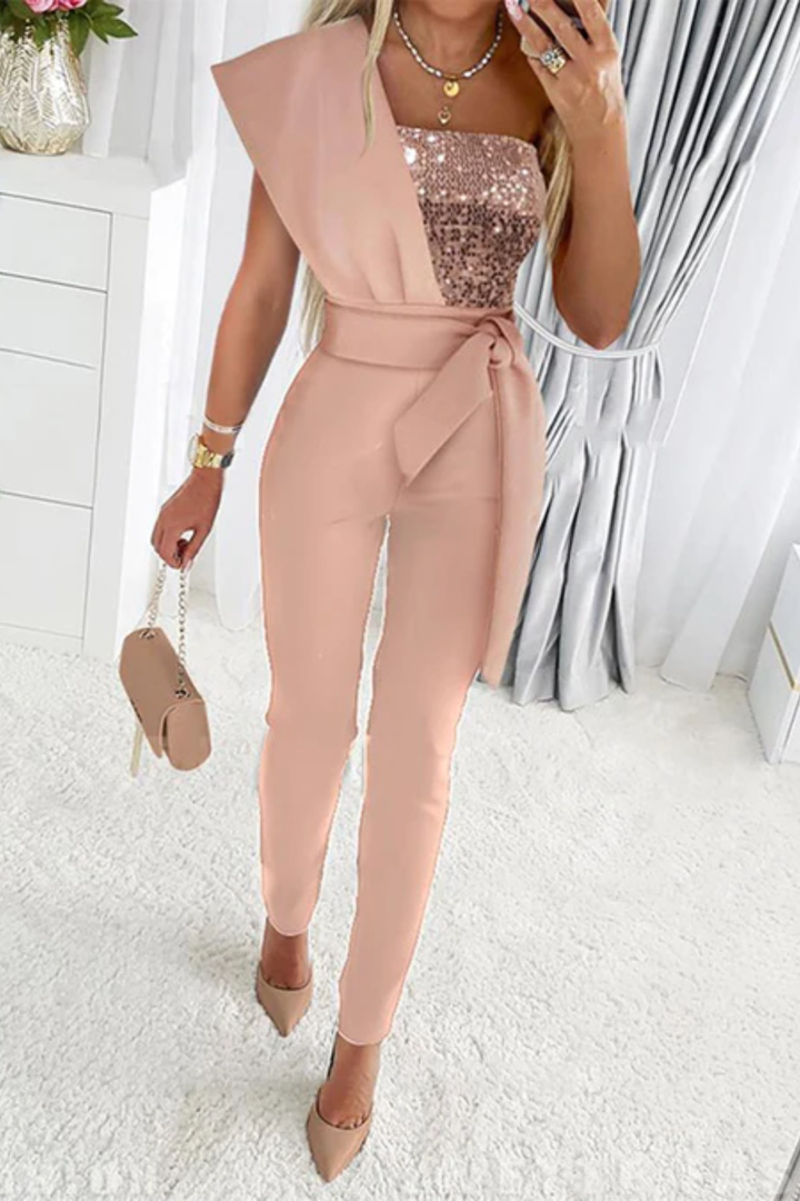 Chic women's sequin jumpsuit, a one-piece design showcasing shimmering fabric, perfect for formal attire.