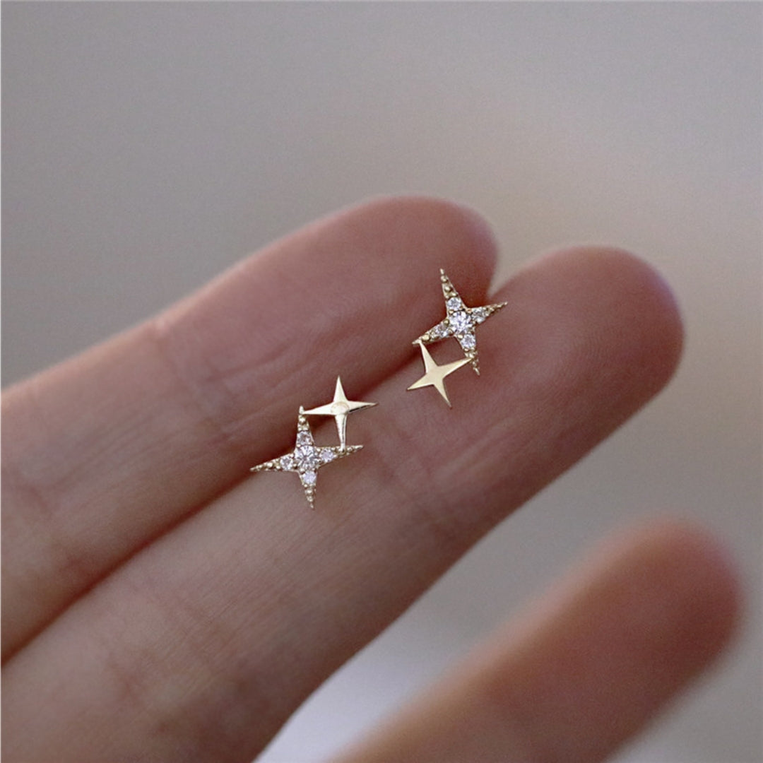 Sparkling women's star stud earrings with brilliant zirconia stones, perfect for elegant fashion jewelry.