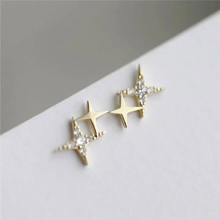 Chic women's star stud earrings with dazzling zirconia, adding a touch of sparkling elegance to any look.