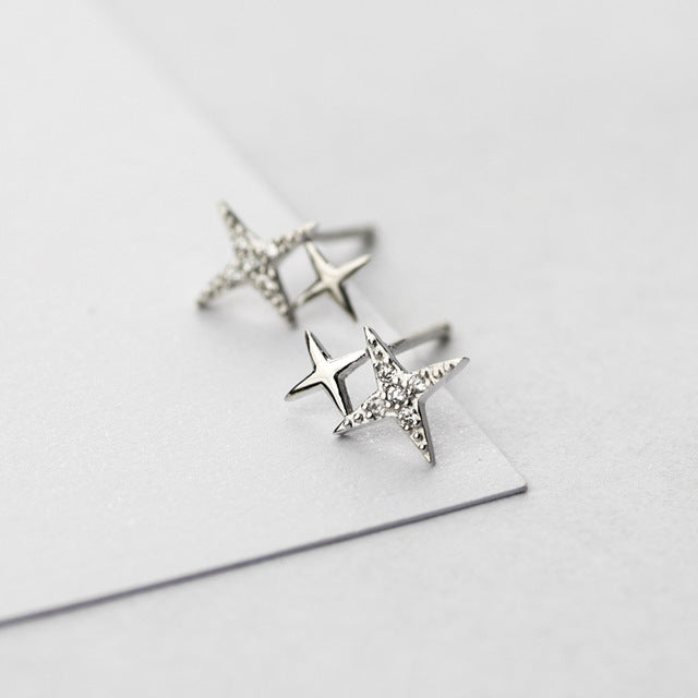 Beautiful women's stud earrings: sparkling star design with brilliant zirconia, a celestial fashion accessory.