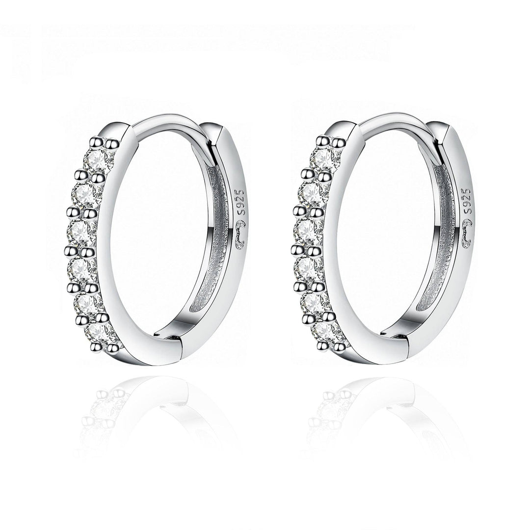 Sparkling women's zirconia hoop earrings, silver and gold plated. Elegant fine jewelry for her.