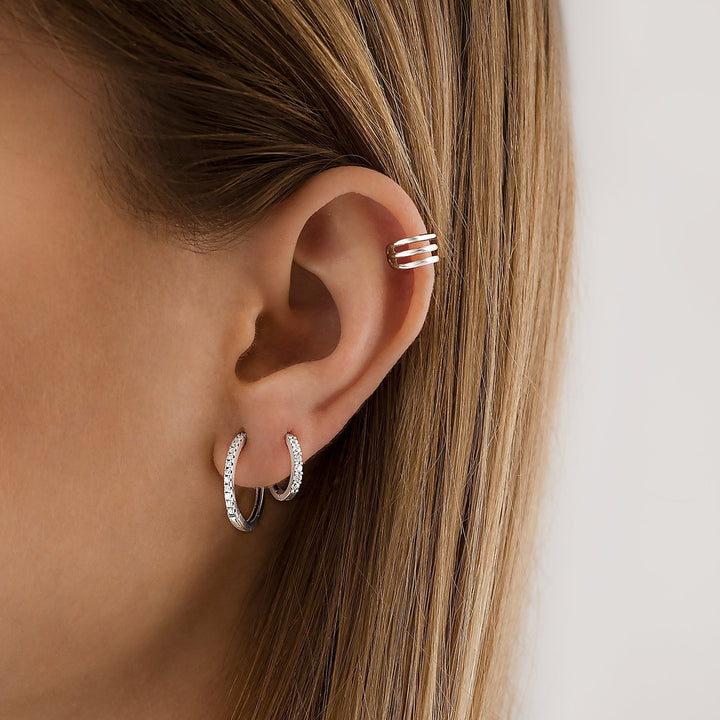 Glistening zirconia hoop earrings for women, silver & gold plated. A sparkling elegant gift for her.