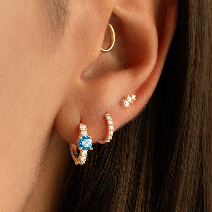 Elegant & sparkling women's zirconia hoop earrings, featuring both silver and gold plating. Fine jewelry.