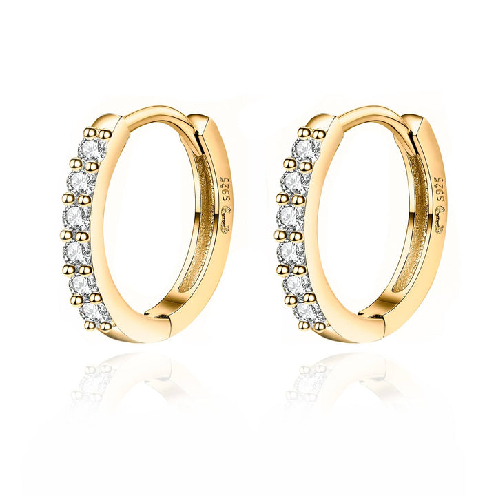 Chic women's hoop earrings with dazzling zirconia gems, silver & gold plated. Versatile fine jewelry.