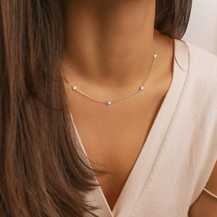 Elegant gold-plated zirconia necklace for women, featuring a brilliant sparkling pendant and adjustable chain. A perfect gift.