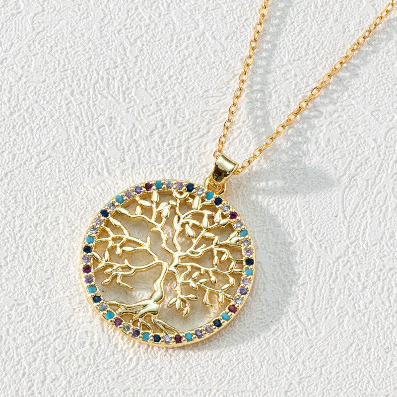 Women's sterling silver Tree of Life pendant with intricate zirconia detailing, a spiritual necklace.