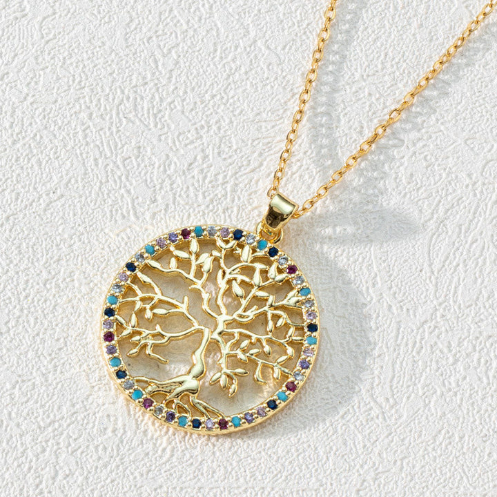 Women's sterling silver Tree of Life pendant with intricate zirconia detailing, a spiritual necklace.