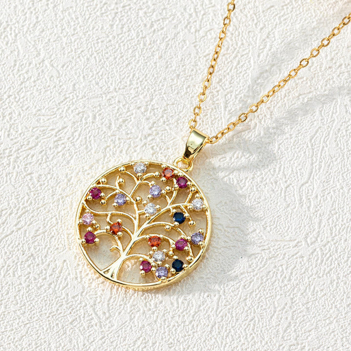 Close-up of a vibrant Zirconia Tree of Life pendant, a round spiritual necklace for women.