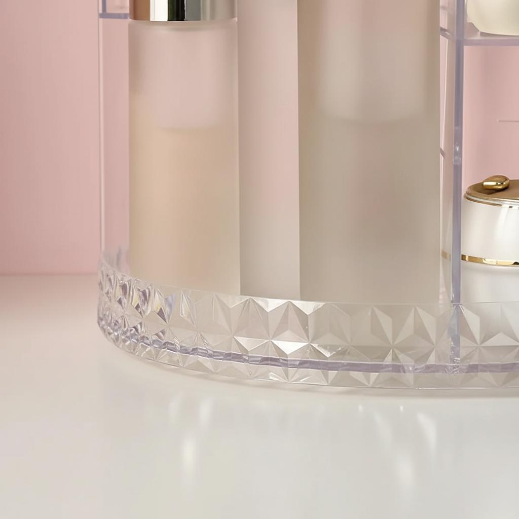 Rotating makeup caddy, SpinLuxe acrylic cosmetic organizer for efficient and neat beauty product storage.