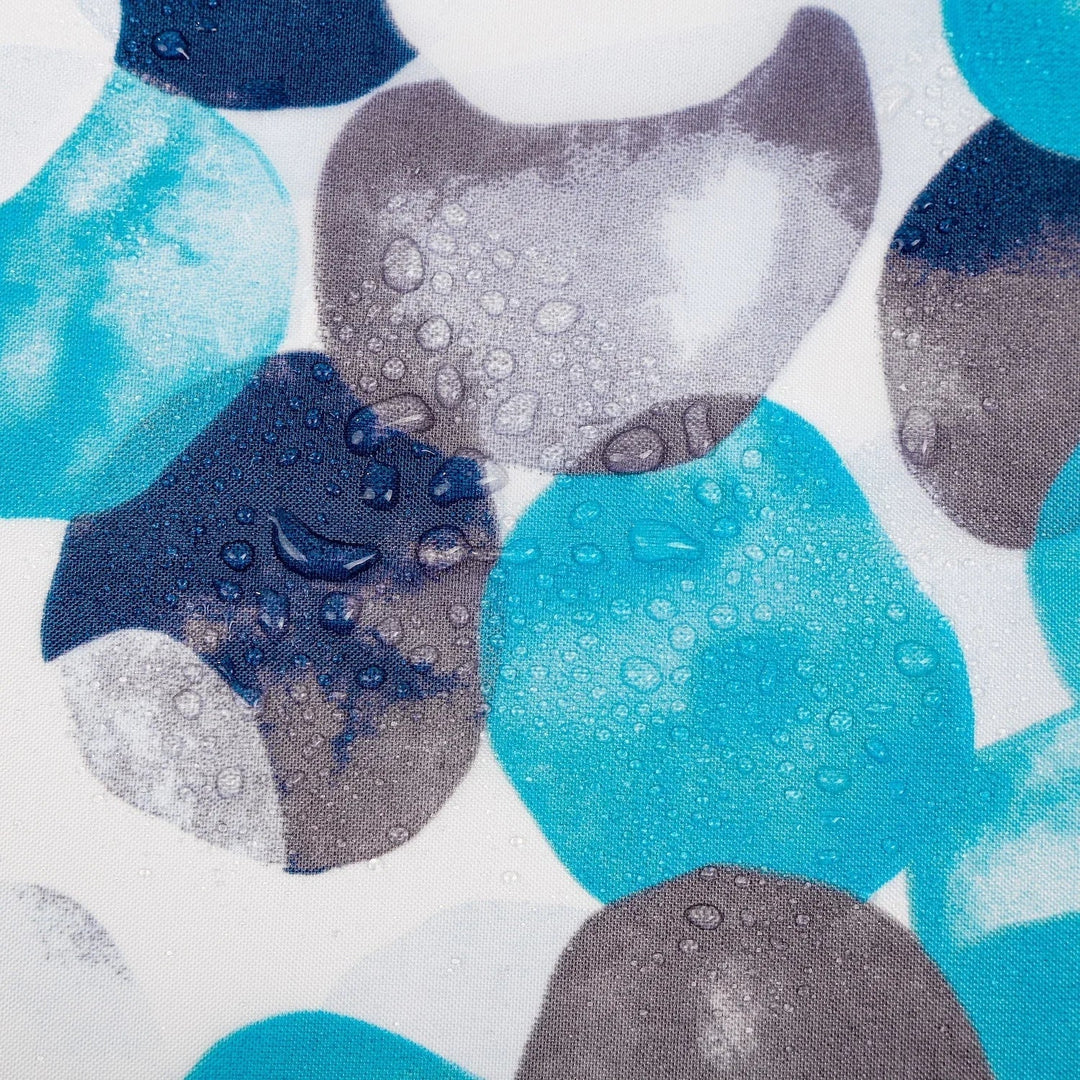 SplashDot's water repellent fabric shower curtain, demonstrating water beading effect