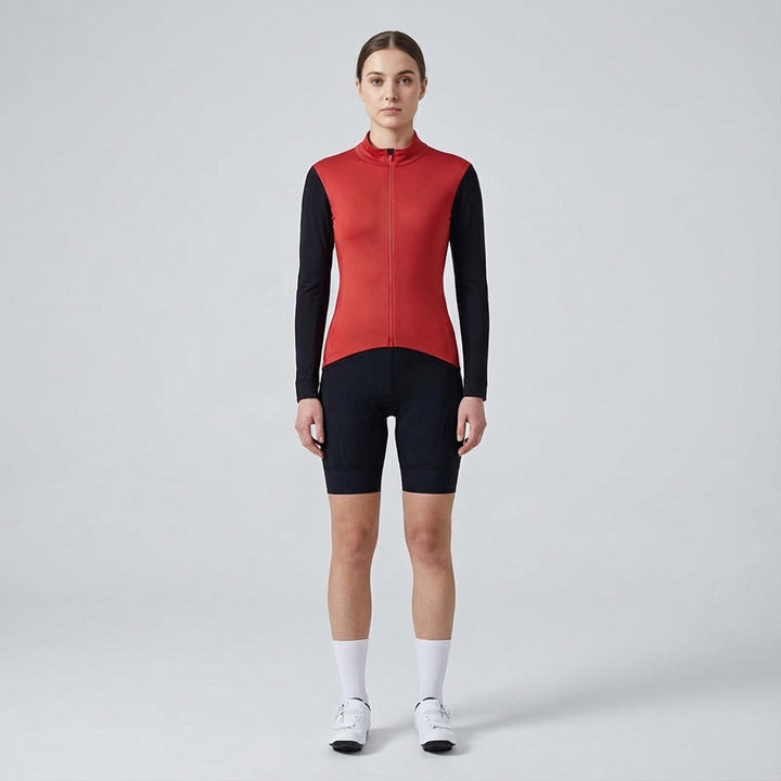 Three women's sporty cycling jackets side-by-side: pink, red, and black activewear for biking