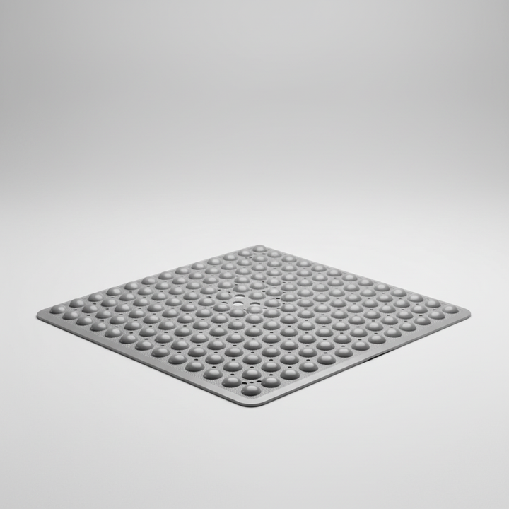 Essential bathroom accessory: square PVC shower mat, GripSquare, for anti-slip protection.