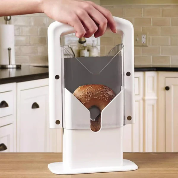 Stainless steel bagel slicer for effortless, perfect cuts. Safe kitchen tool for breakfast food prep.