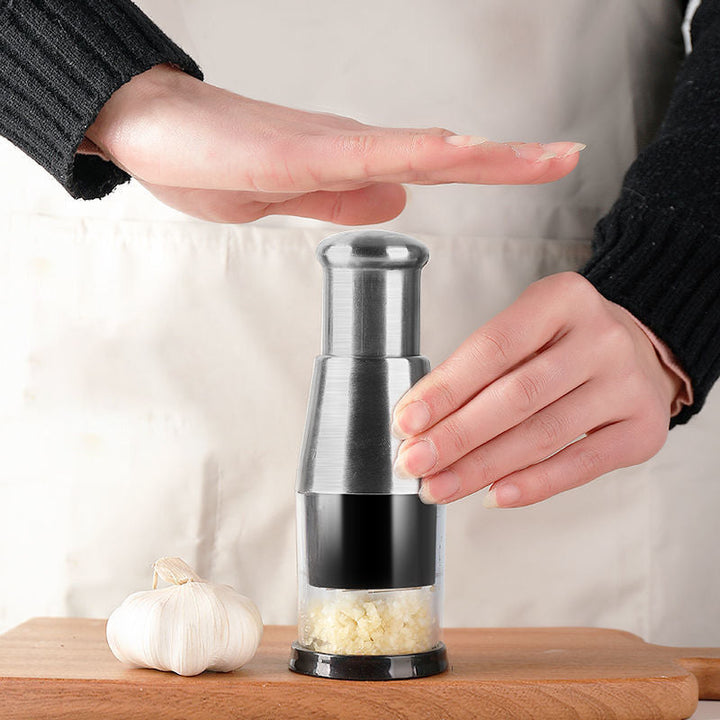 Stainless steel garlic press, an essential time-saving kitchen tool for effortless cooking.