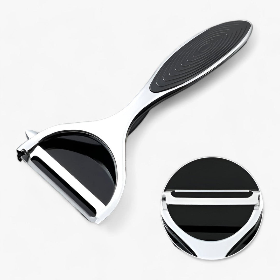 Ergonomic stainless steel peeler easily slices & peels fruits & vegetables. Quick kitchen food prep.
