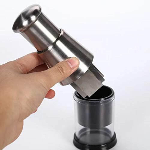Compact manual vegetable chopper, a versatile kitchen gadget for efficient food prep.