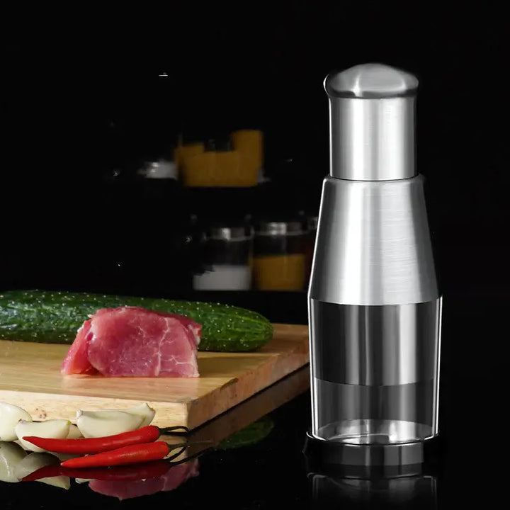 Sleek stainless steel manual vegetable chopper, durable for everyday kitchen use.