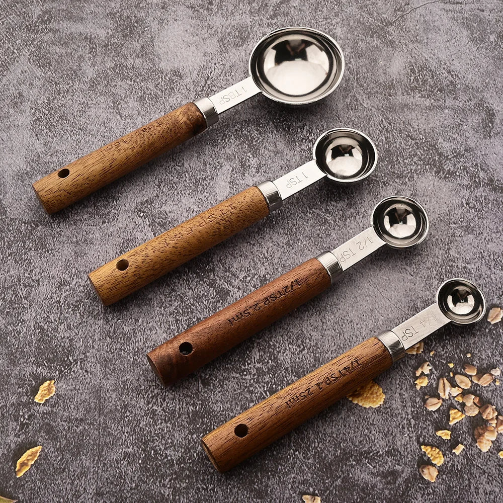 Durable and beautiful stainless steel measuring spoon set with natural wood handles, great kitchen decor.