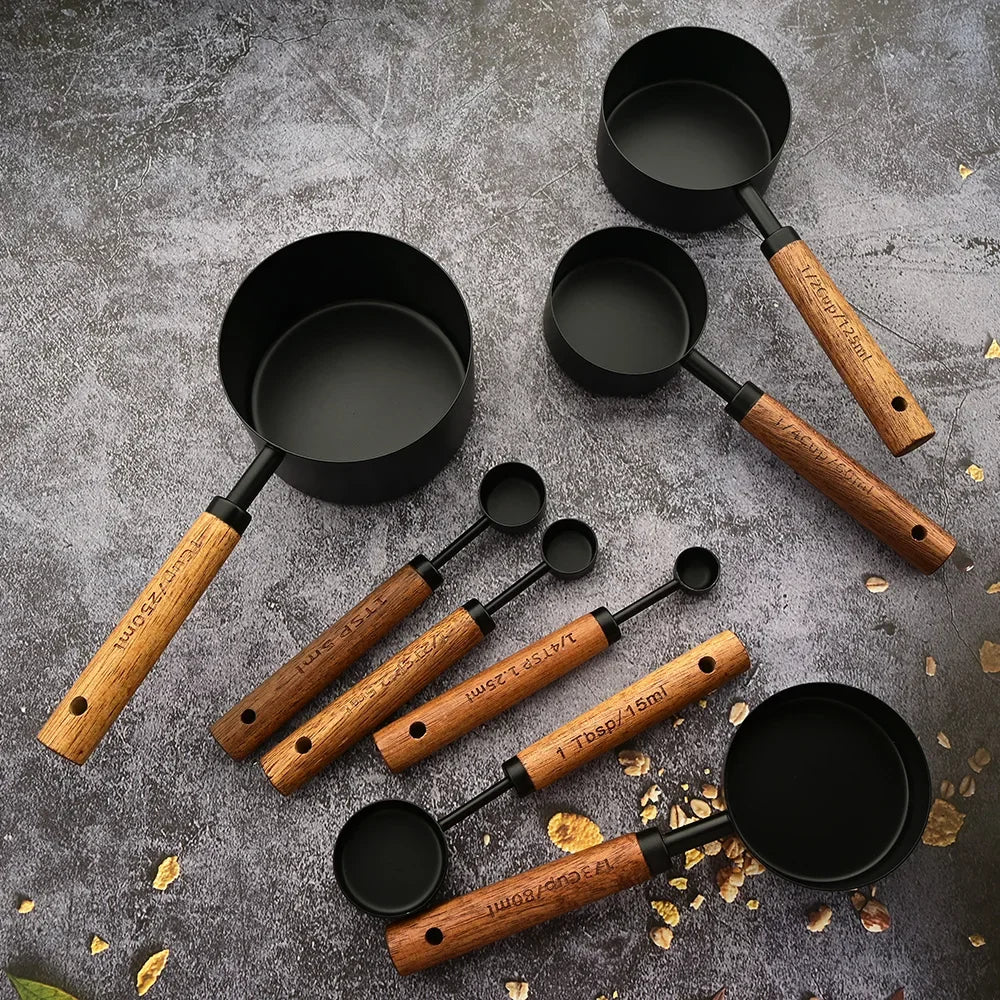 Gift idea: Elegant measuring spoon set with polished stainless steel & natural wood handles for any chef.
