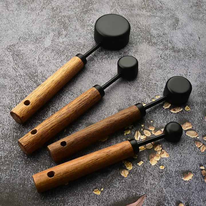 Accurate cooking utensils: Stainless steel measuring spoons with comfortable wood handles, a complete set.