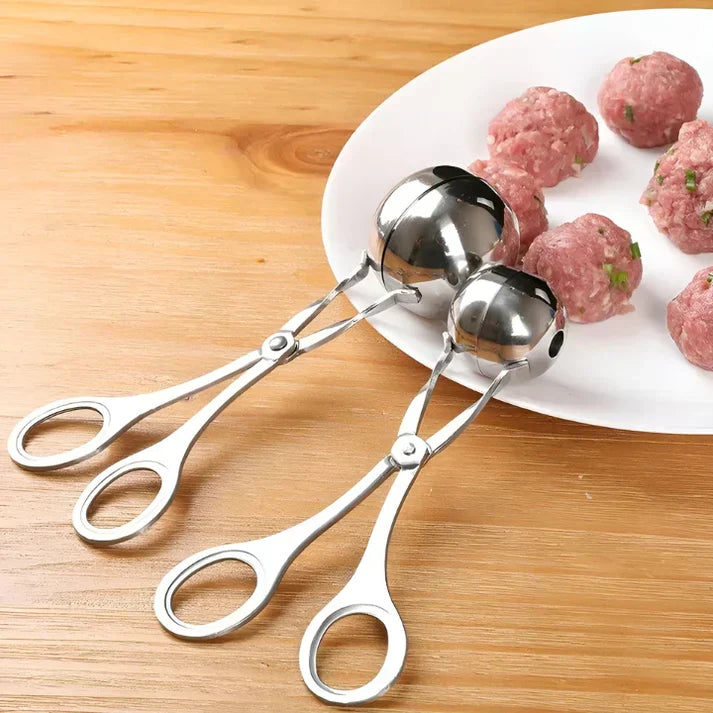 Stainless steel meatball maker tool for easy, quick, and uniform homemade meatballs in your kitchen.