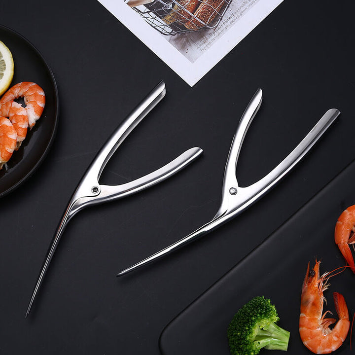 Stainless steel shrimp peeler tool for quick and easy seafood preparation, durable kitchen gadget for shellfish.