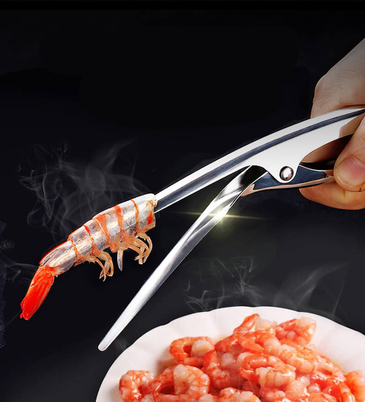 Ergonomic stainless steel shrimp peeler for effortless peeling of prawns and shellfish, a must-have kitchen tool.