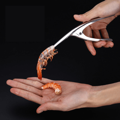 Innovative stainless steel shrimp peeler, an efficient cooking gadget for fast and easy shellfish preparation in the kitchen.