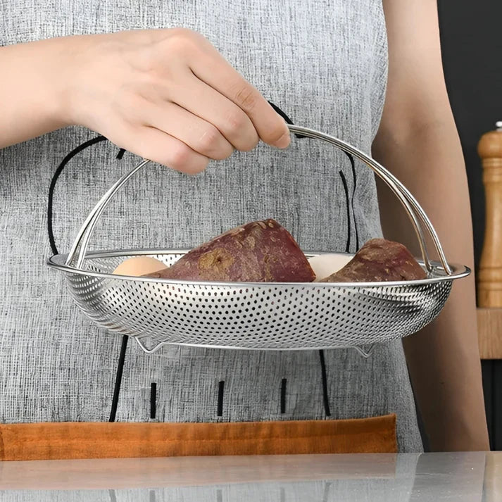 Foldable stainless steel steamer basket, perfect for space-saving healthy vegetable & dumpling steaming.