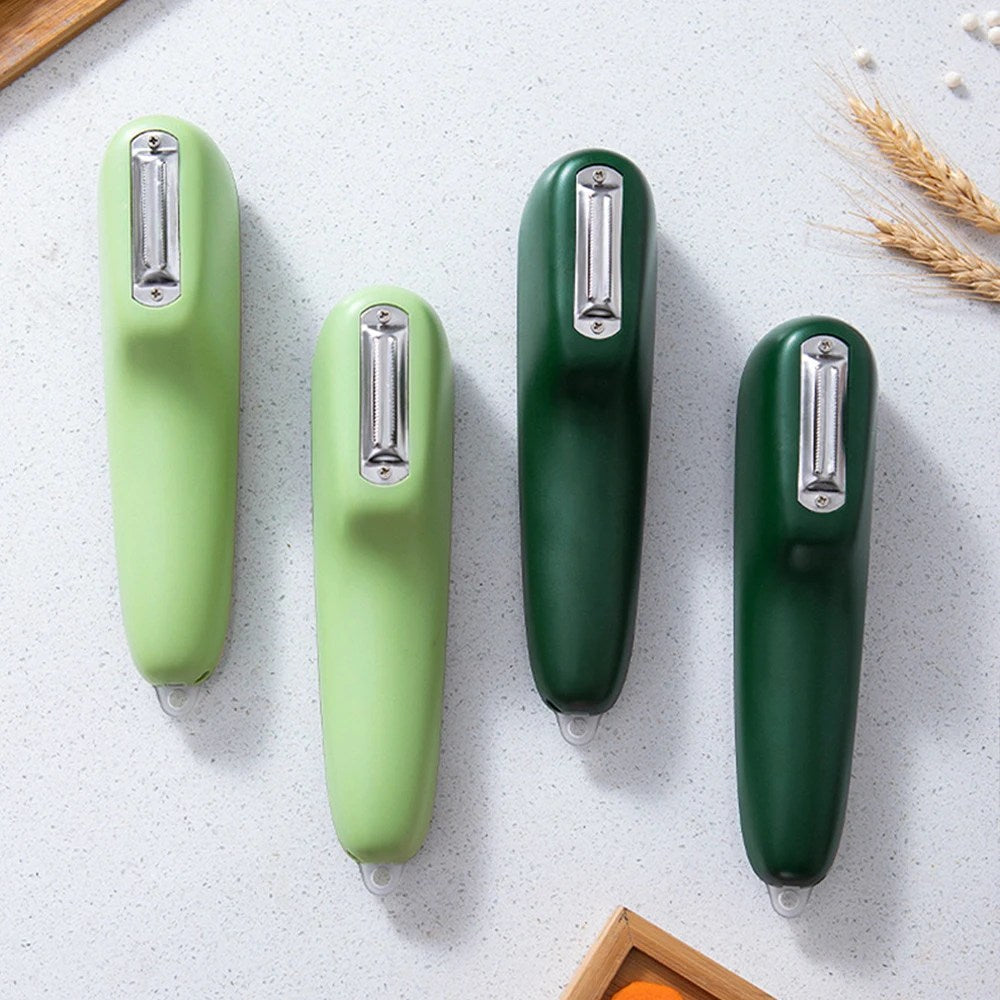 Durable stainless steel kitchen tool, a vegetable & fruit peeler with an integrated container for tidy and quick peeling.