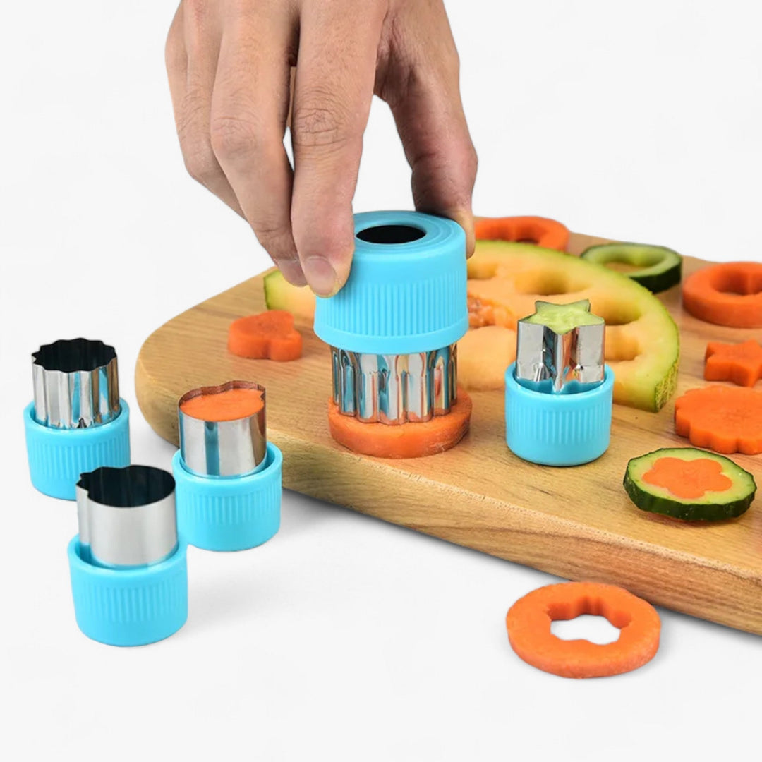Kids' food cutter set: star, heart, & flower shapes for cookies, fruit, & vegetables. Ideal for playful meals.