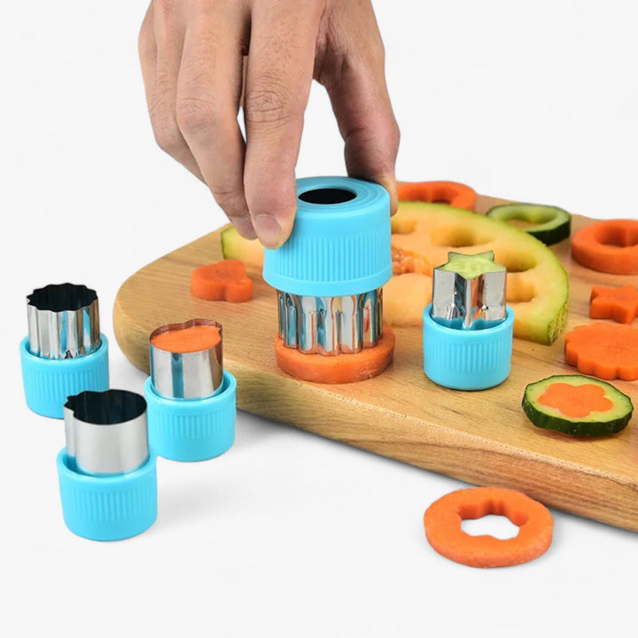 Kids' food cutter set: star, heart, & flower shapes for cookies, fruit, & vegetables. Ideal for playful meals.