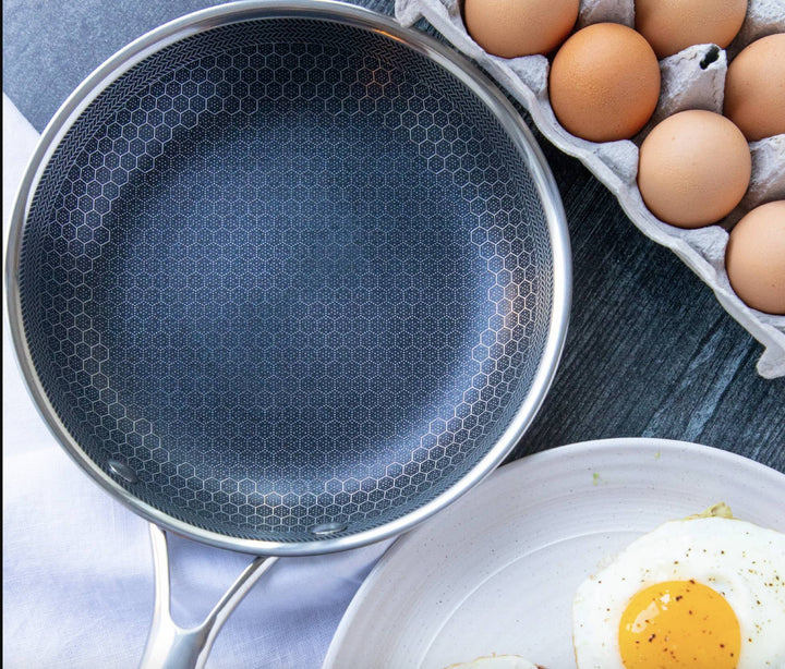 Effortless cooking with SteelChef non-stick frying pan, featuring quick food release and even heat distribution.