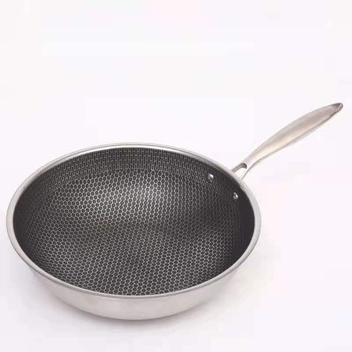 Easy-clean SteelChef non-stick frying pan, oven safe and scratch resistant, enhancing your cooking experience.