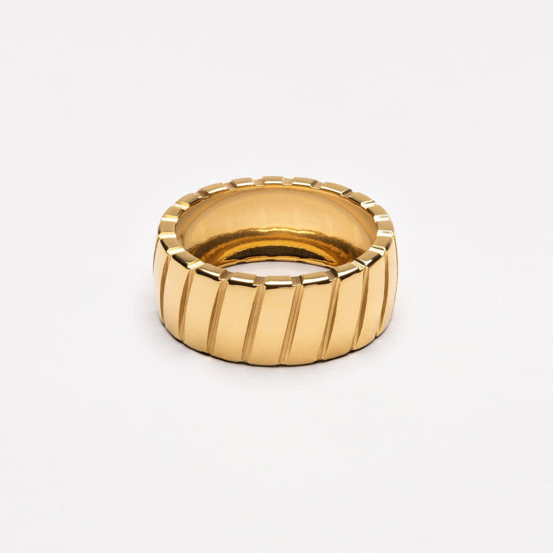 Stella women's bold statement ring, a modern gold metal accessory for chic fashion. Perfect gift for her.