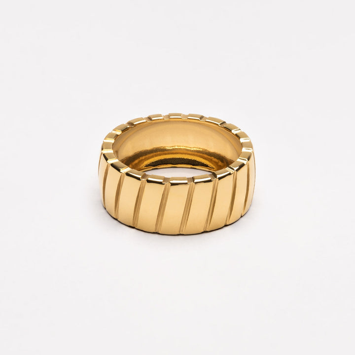 Stella women's bold statement ring, a modern gold metal accessory for chic fashion. Perfect gift for her.