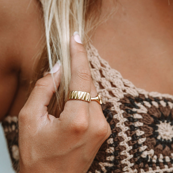 Elegant Stella silver statement ring, a bold metal women's accessory for modern fashion jewelry.
