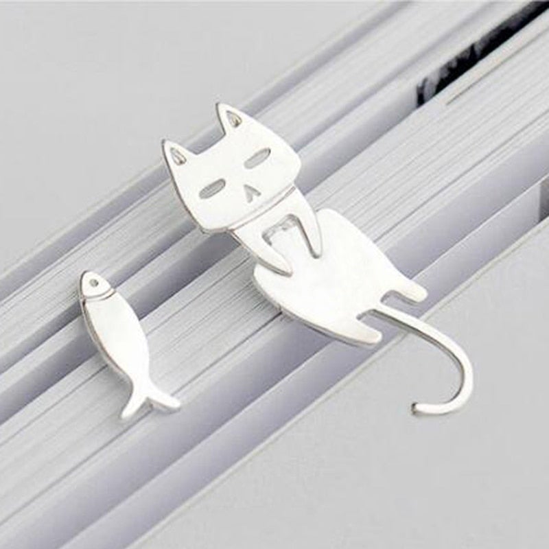 Unique sterling silver climbing cat earrings. Whimsical feline design, a charming and playful accessory for women.