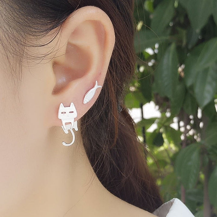 Elegant sterling silver climbing cat earrings. Women's animal jewelry, perfect whimsical gift for cat lovers.