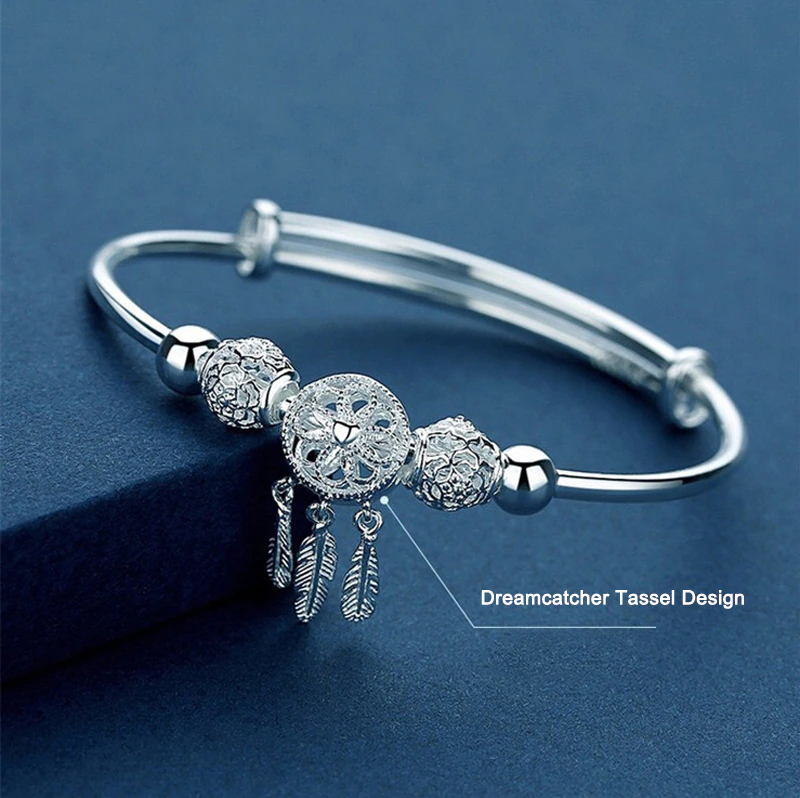 Adjustable sterling silver dreamcatcher bracelet for women, symbolizing protection & good vibes.