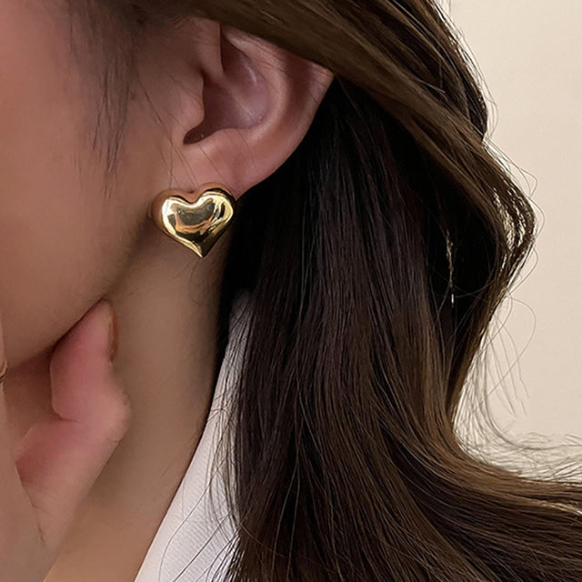 Timeless elegant sterling silver heart earrings, gold plated finish.