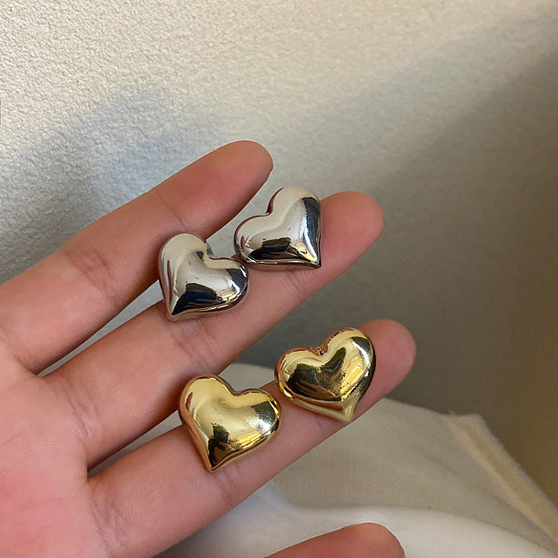 Women's sterling silver & gold plated heart dangle earrings, elegant fashion jewelry.